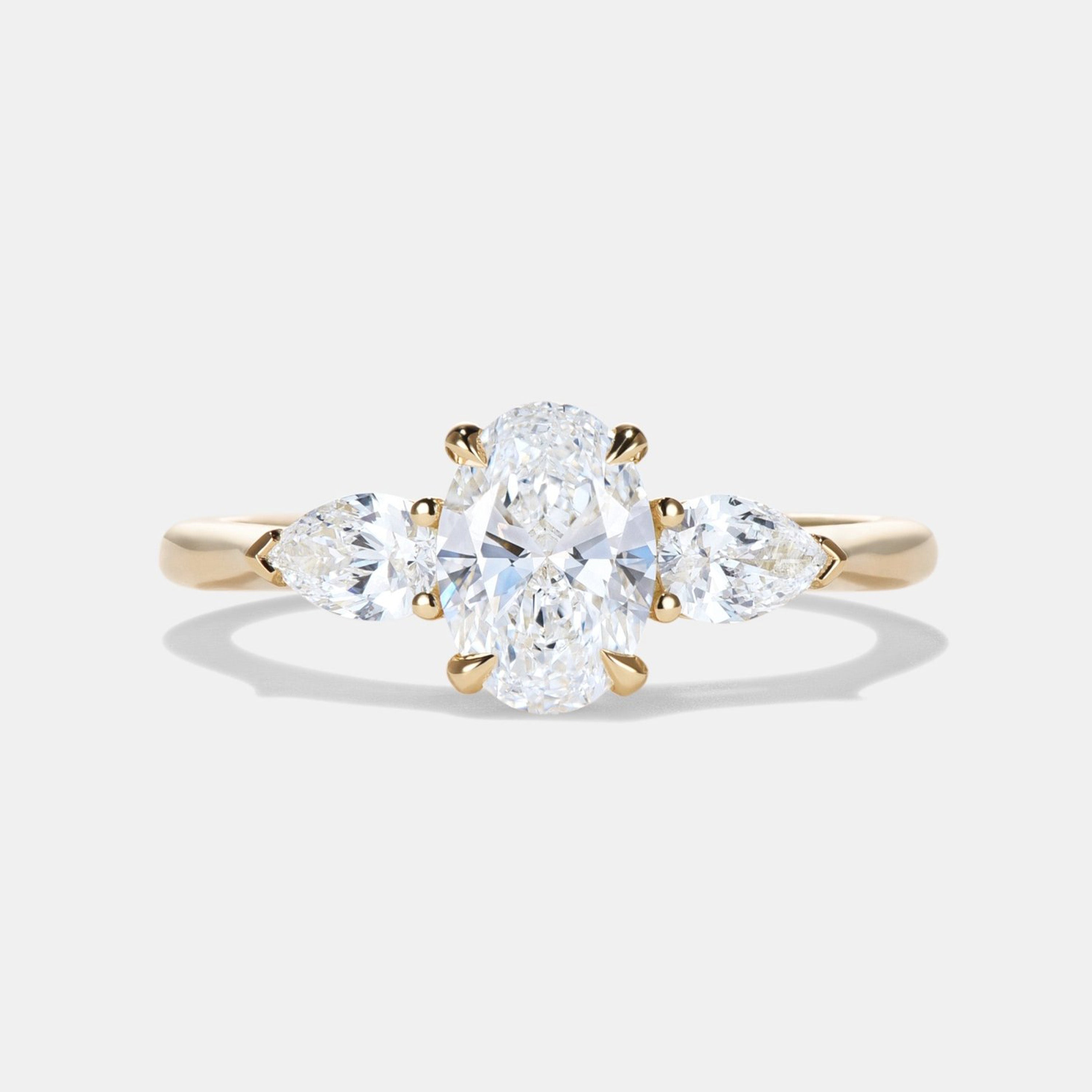 Aurora 0.80ct Oval Diamond Three Stone Engagement Ring