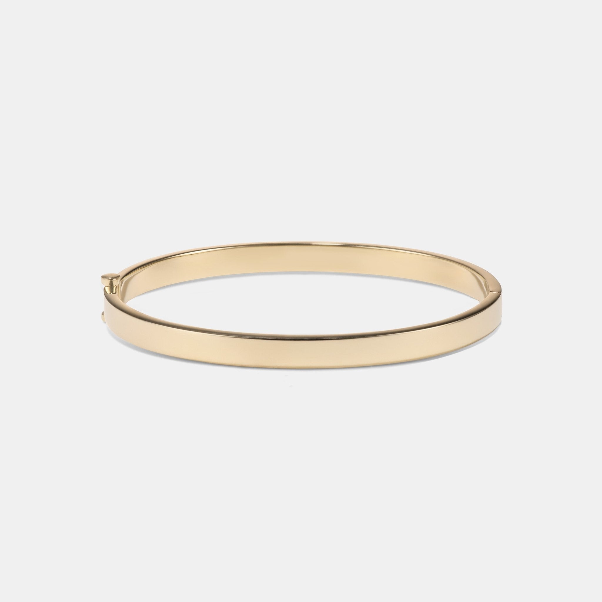 Hinged Bangle in 9 karat yellow gold