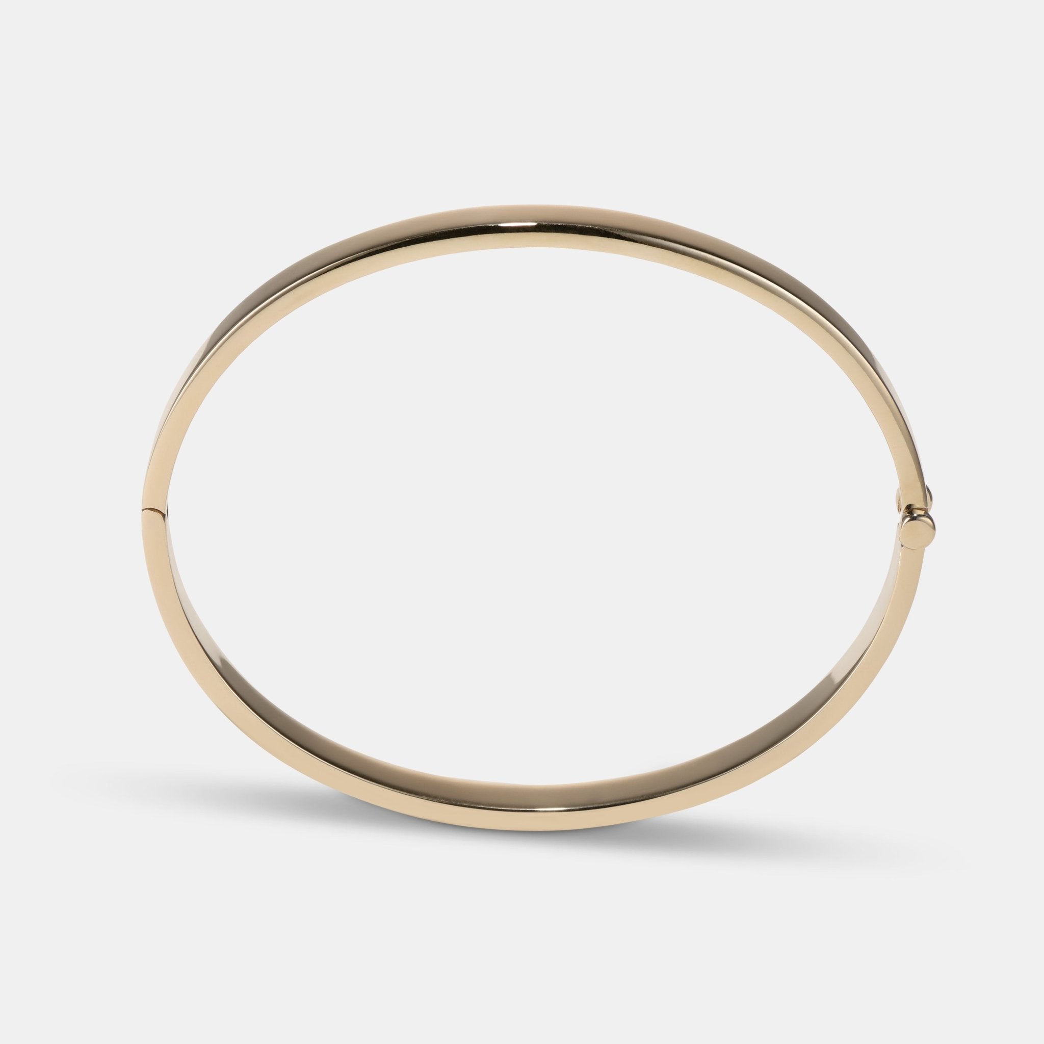 Hinged Bangle in 9 karat yellow gold