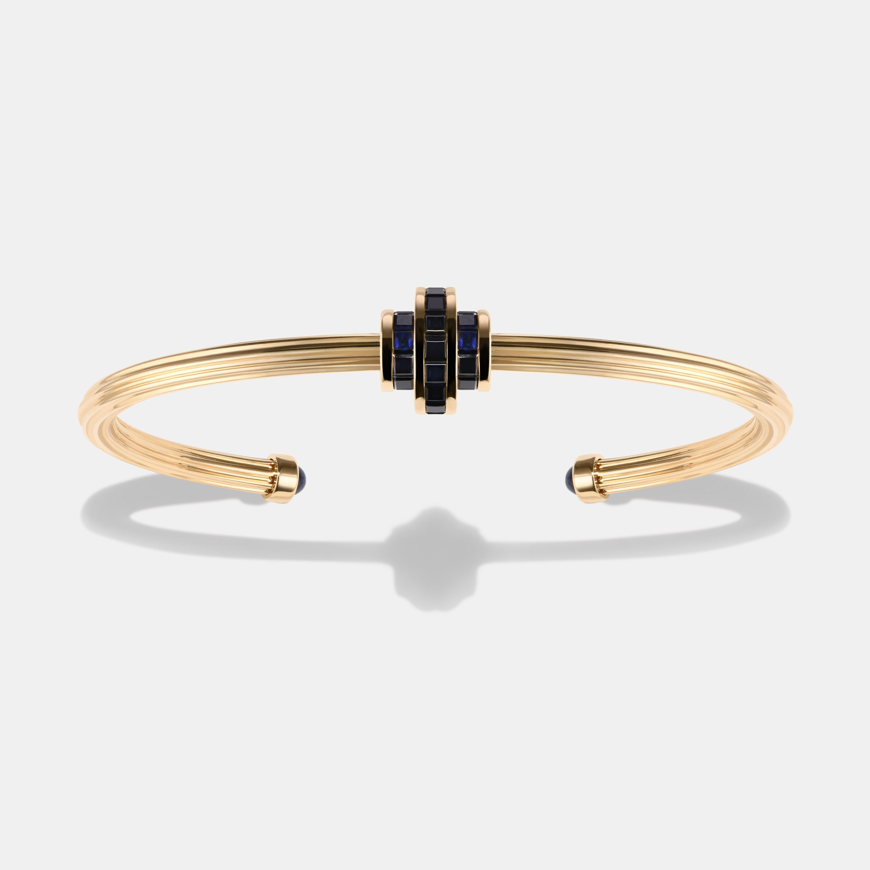 Cog Sapphire Wrist Cuff in 9 karat yellow gold