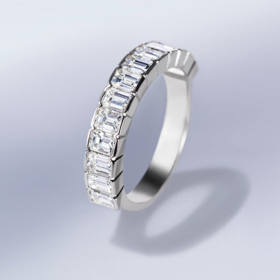 Flyerfit Channel/Shared Prong 14K White Gold Wedding Band H- | Wesche  Jewelers | Melbourne, FL