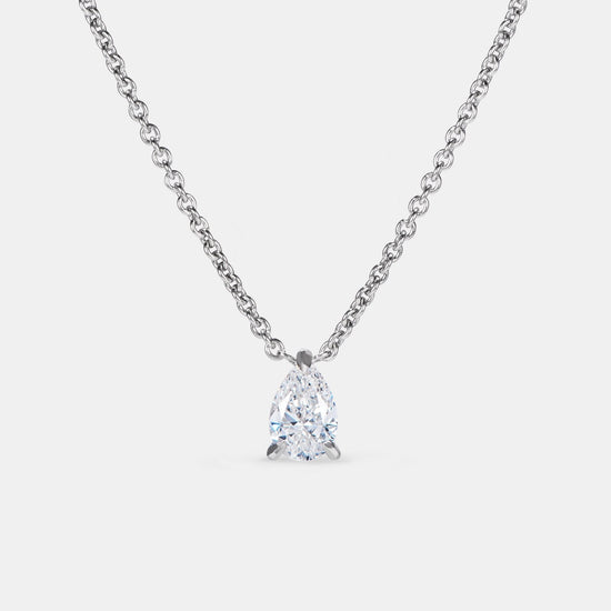 6x4 mm Pear Shape Ruby and 1/10 Ctw Round Cut Diamond Pendan | Becker's  Jewelers | Burlington, IA